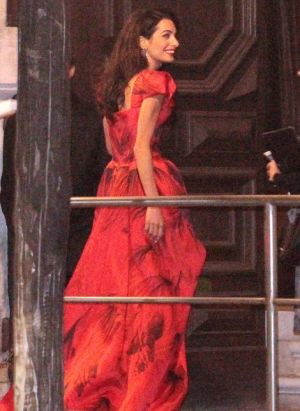 George Clooney Amal Alamuddin - pre-wedding Venice - red Alexander McQueen dress.jpg